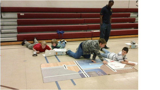 :fll webpage picts:Teams at work:greg's team planning.jpg